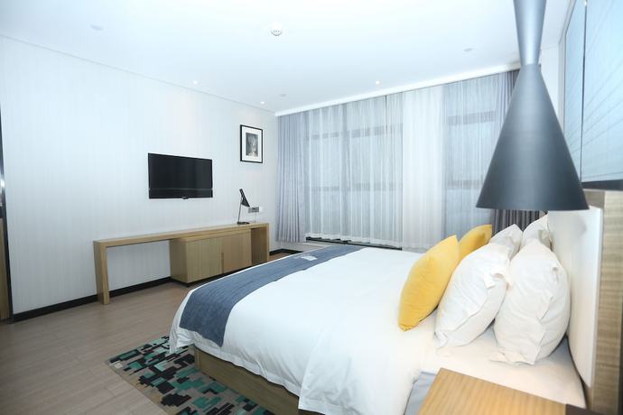 Imagen de la habitación del Hotel Echarm Zhengzhou High Tech Zone. Foto 14