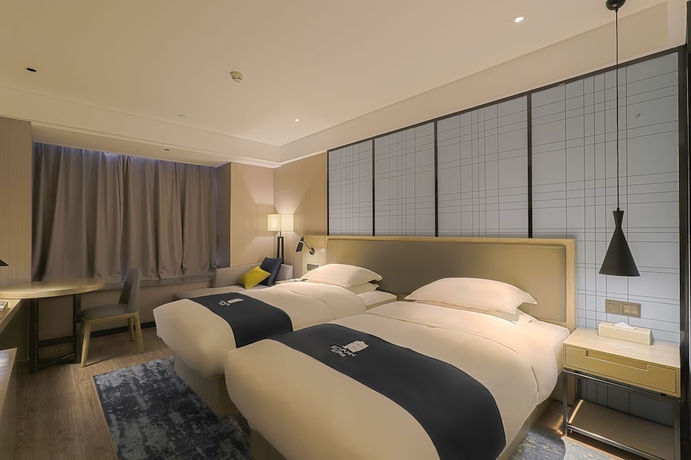 Imagen de la habitación del Hotel Echarm （xi Qiao Shan, Foshan）. Foto 8