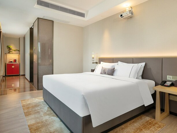Imagen de la habitación del Hotel Echeng Shenzhen Tian'an Yungu. Foto 22