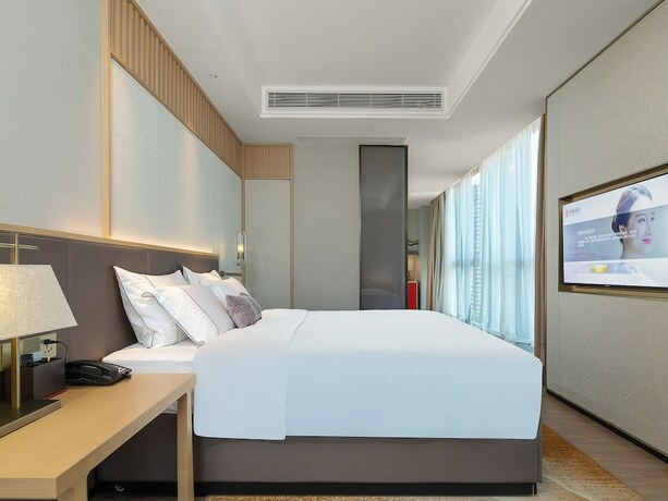 Imagen de la habitación del Hotel Echeng Shenzhen Tian'an Yungu. Foto 23