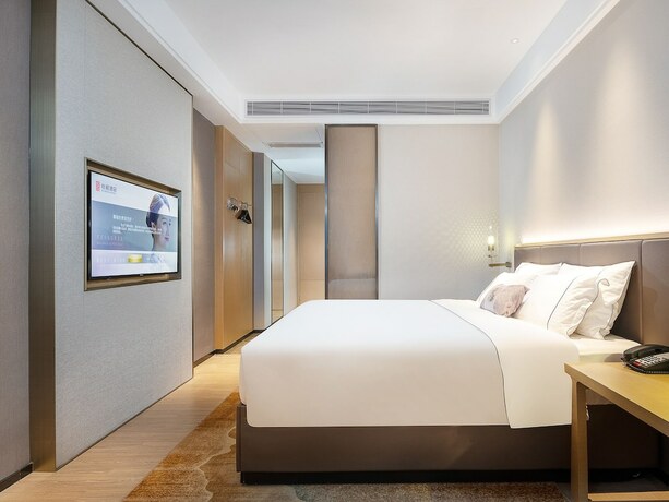 Imagen de la habitación del Hotel Echeng Shenzhen Tian'an Yungu. Foto 25