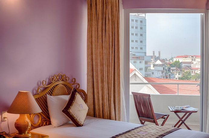 Imagen de la habitación del Hotel &Ecirc;mm Hue. Foto 10