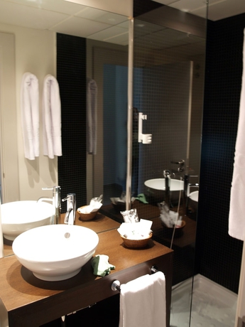 Imagen de la habitación del Hotel Eco Alcala Suites. Foto 12