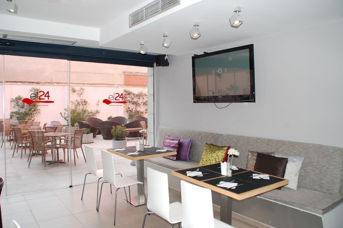 Imagen del bar/restaurante del Hotel Eco Alcala Suites. Foto 7