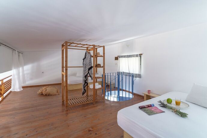 Imagen de la habitación del Hotel Eco Beach and Magic Garden. Foto 18