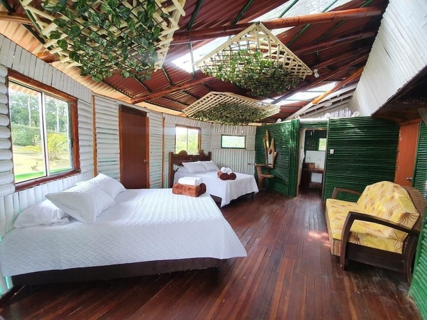 Imagen de la habitación del Hotel Eco Caba&ntilde;as Green Eden. Foto 5