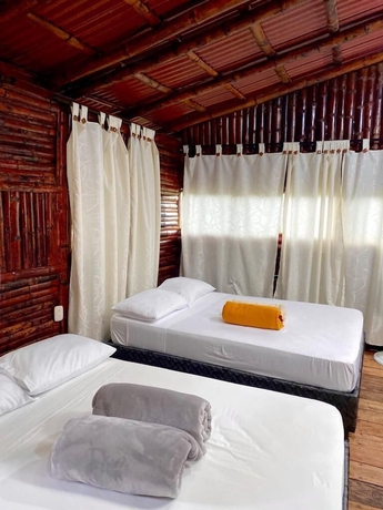 Imagen de la habitación del Hotel Eco Caba&ntilde;as Green Eden. Foto 9