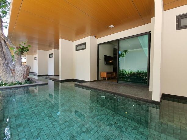 Imagen de la habitación del Hotel Eco Cozy Beachfront Resort Chaam. Foto 17
