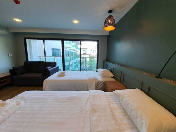 Imagen de la habitación del Hotel Eco Cozy Beachfront Resort Chaam. Foto 20