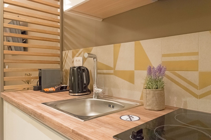Imagen de la habitación del Hotel Eco Green Residences and Suites. Foto 16