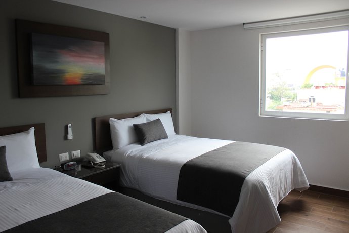 Imagen de la habitación del Hotel Eco Guadalajara Expo. Foto 9