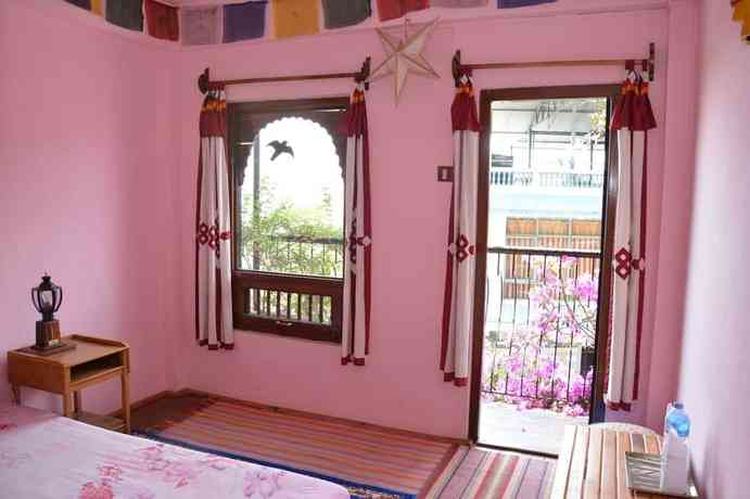 Imagen de la habitación del Hotel Eco Home. Foto 5