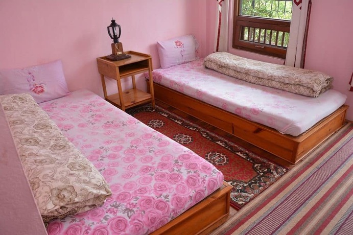 Imagen de la habitación del Hotel Eco Home. Foto 6