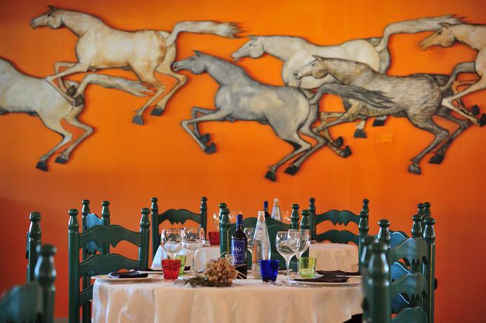 Imagen del bar/restaurante del Hotel Eco Hotel Orlando. Foto 2