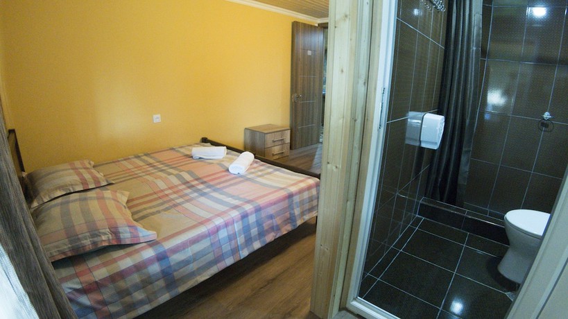 Imagen de la habitación del Hotel Eco House In Bakuriani. Foto 10