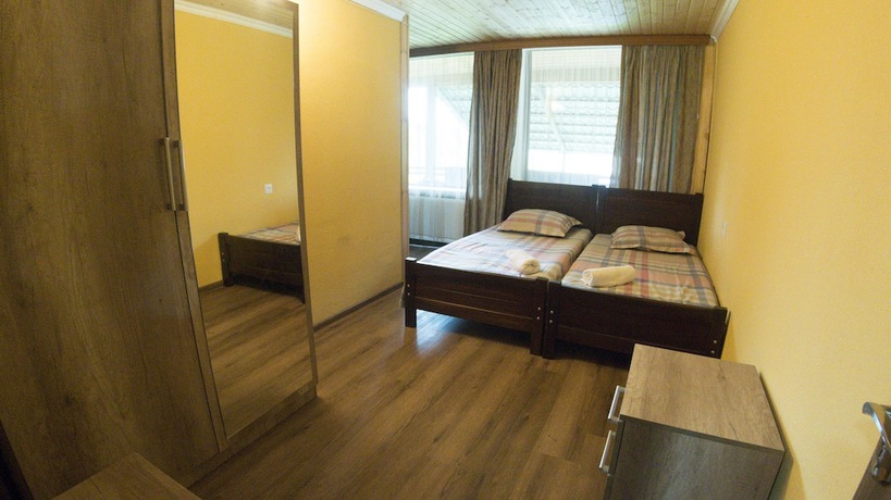 Imagen de la habitación del Hotel Eco House In Bakuriani. Foto 17