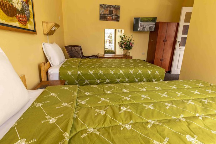 Imagen de la habitación del Hotel Eco Inn. Foto 2