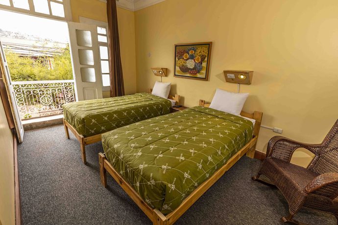 Imagen de la habitación del Hotel Eco Inn. Foto 3