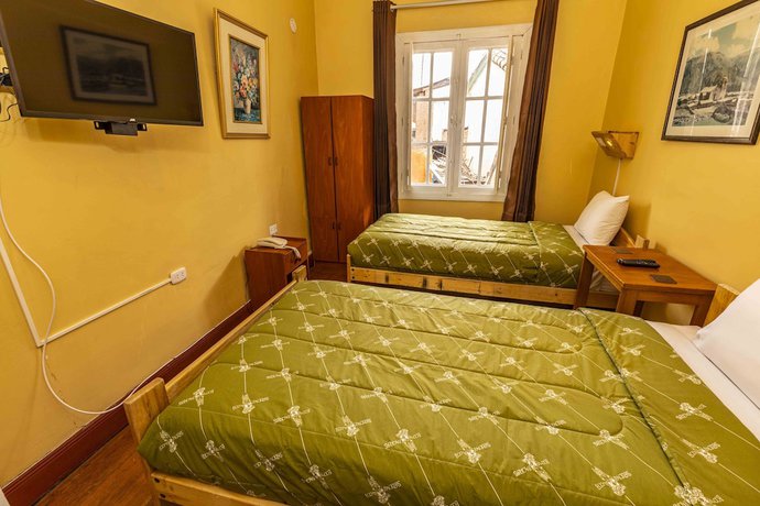 Imagen de la habitación del Hotel Eco Inn. Foto 4