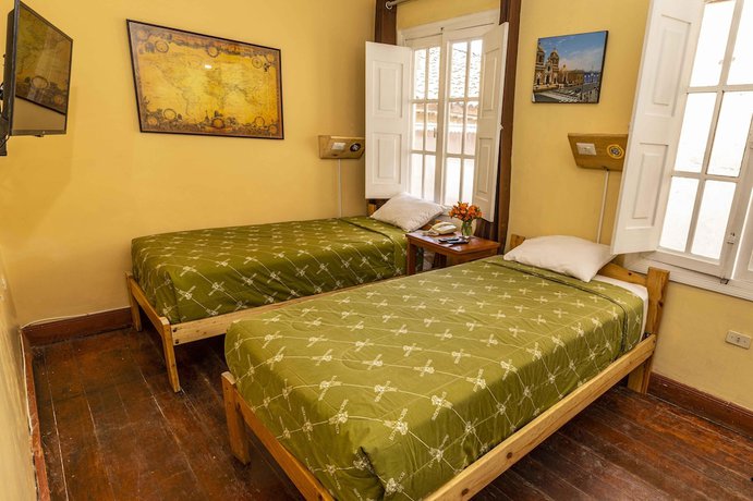 Imagen de la habitación del Hotel Eco Inn. Foto 5