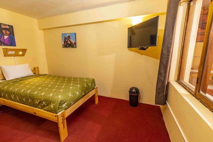 Imagen de la habitación del Hotel Eco Inn. Foto 6