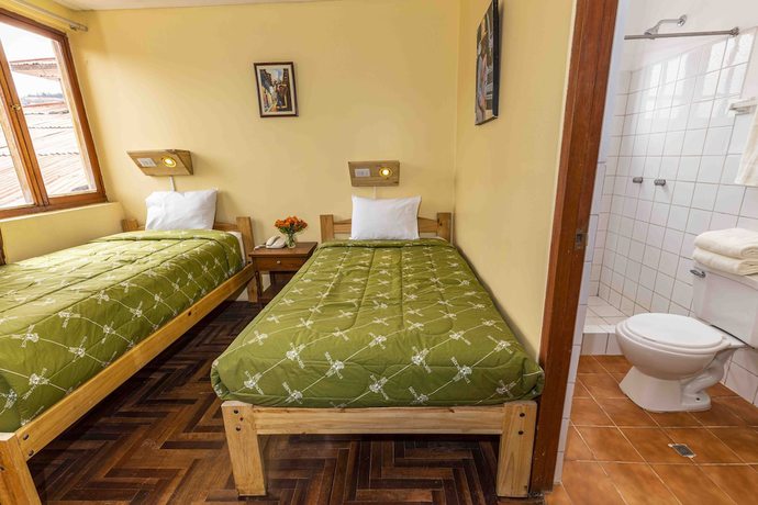 Imagen de la habitación del Hotel Eco Inn. Foto 11