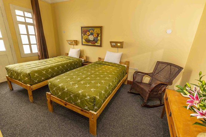 Imagen de la habitación del Hotel Eco Inn. Foto 16