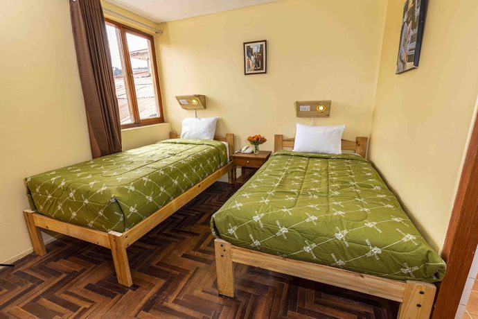 Imagen de la habitación del Hotel Eco Inn. Foto 18