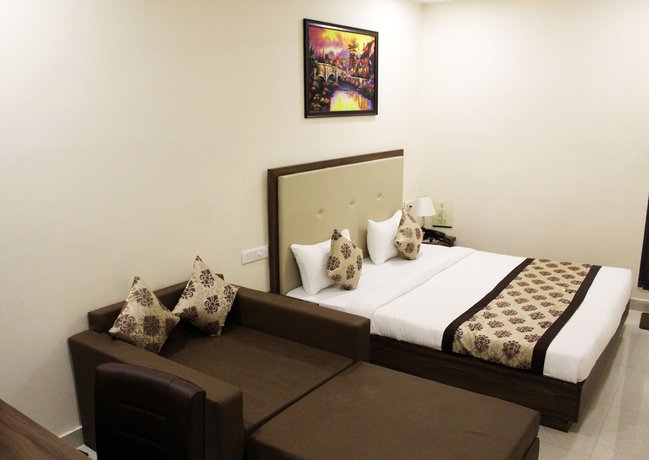 Imagen de la habitación del Hotel Eco Inn, Jamnagar. Foto 2