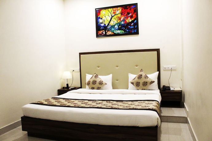 Imagen de la habitación del Hotel Eco Inn, Jamnagar. Foto 3
