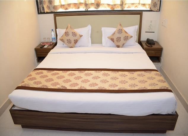 Imagen de la habitación del Hotel Eco Inn, Jamnagar. Foto 4