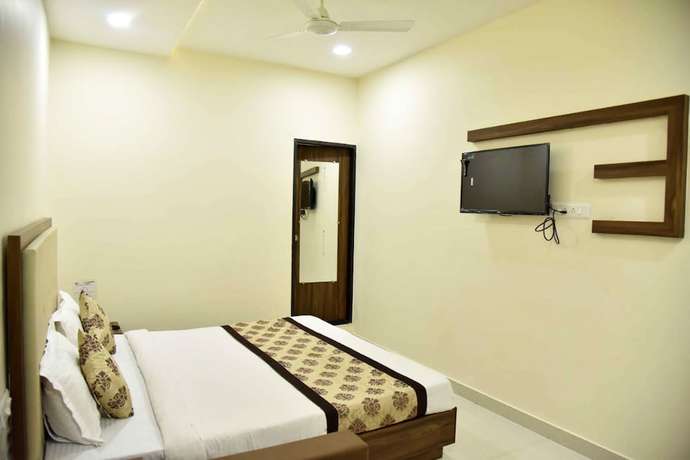 Imagen de la habitación del Hotel Eco Inn, Jamnagar. Foto 5