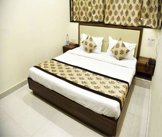Imagen de la habitación del Hotel Eco Inn, Jamnagar. Foto 6