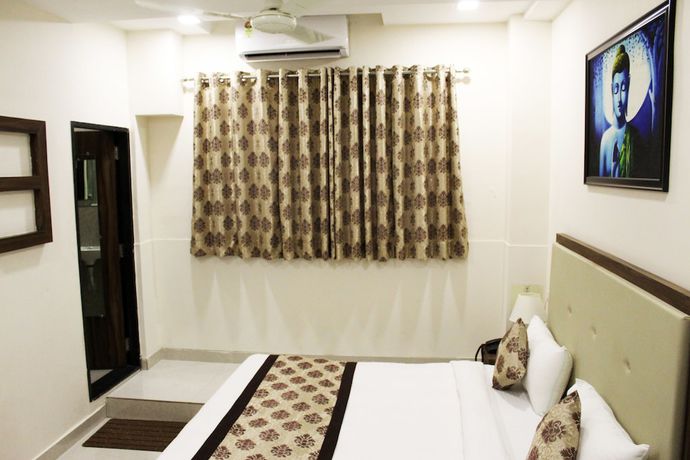 Imagen de la habitación del Hotel Eco Inn, Jamnagar. Foto 7