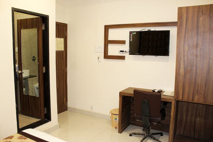 Imagen de la habitación del Hotel Eco Inn, Jamnagar. Foto 8