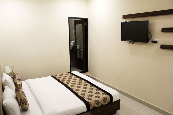 Imagen de la habitación del Hotel Eco Inn, Jamnagar. Foto 9