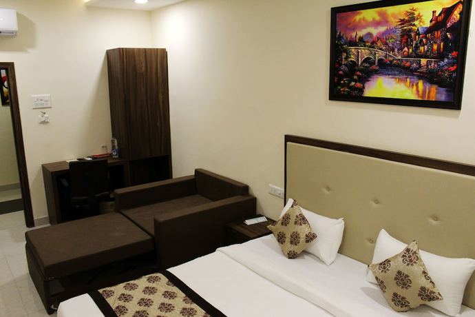 Imagen de la habitación del Hotel Eco Inn, Jamnagar. Foto 10