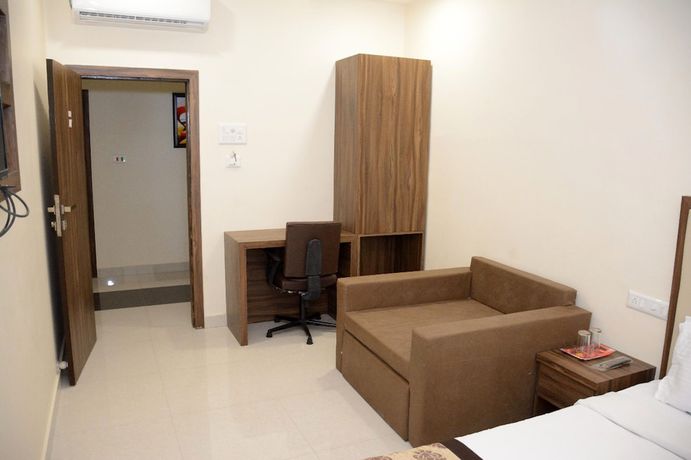 Imagen de la habitación del Hotel Eco Inn, Jamnagar. Foto 11