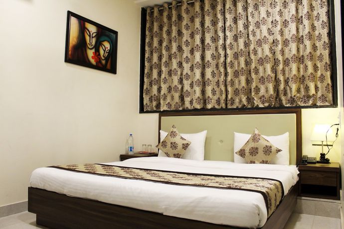 Imagen de la habitación del Hotel Eco Inn, Jamnagar. Foto 12