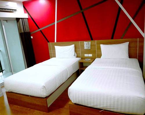 Imagen de la habitación del Hotel Eco Inn Ubon Ratchathani. Foto 7