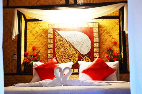 Imagen de la habitación del Hotel Eco Lanta Hideaway Beach Resort. Foto 3