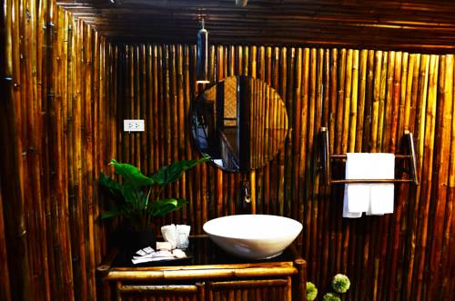 Imagen de la habitación del Hotel Eco Lanta Hideaway Beach Resort. Foto 5