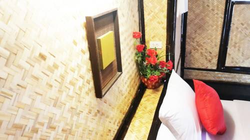 Imagen de la habitación del Hotel Eco Lanta Hideaway Beach Resort. Foto 13