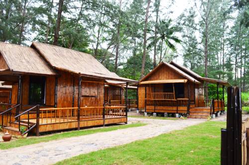 Imagen de la habitación del Hotel Eco Lanta Hideaway Beach Resort. Foto 14