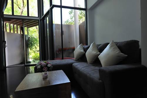 Imagen de la habitación del Hotel Eco Moment Beach Resort. Foto 8