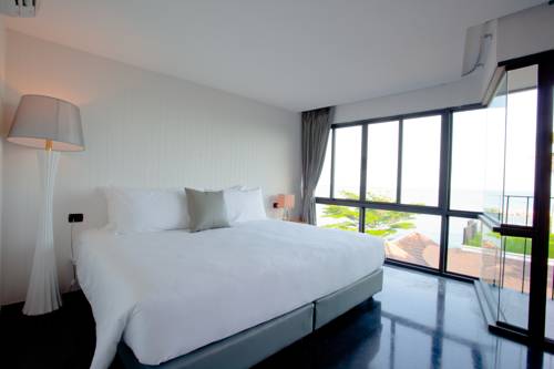 Imagen de la habitación del Hotel Eco Moment Beach Resort. Foto 10