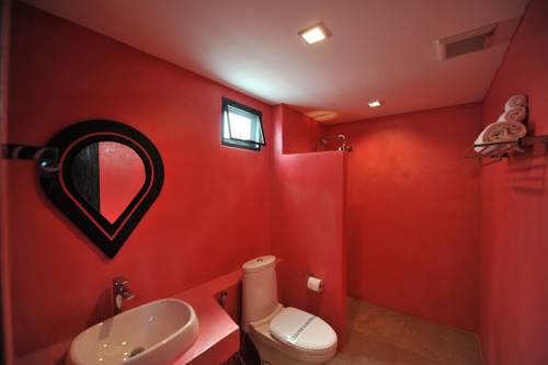 Imagen de la habitación del Hotel Eco Moment Beach Resort. Foto 13