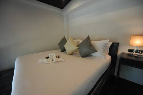 Imagen de la habitación del Hotel Eco Moment Beach Resort. Foto 16