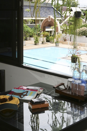 Imagen de la piscina del Hotel Eco Resort Chiang Mai. Foto 16