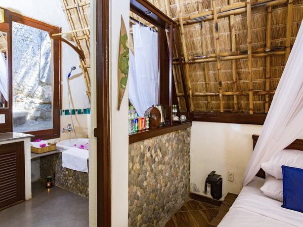 Imagen de la habitación del Hotel Eco Spa Village. Foto 13
